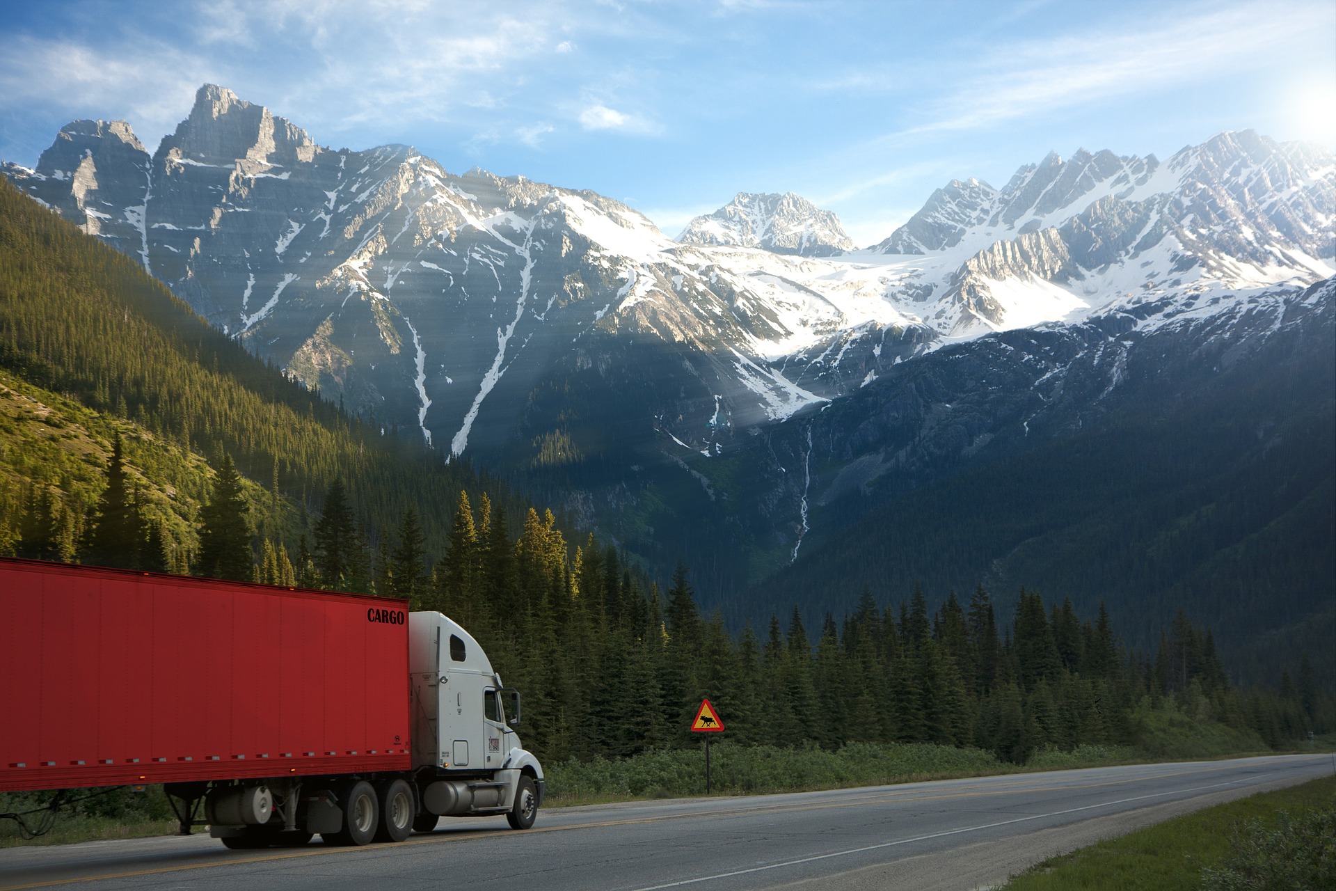 Truck driving through mountains